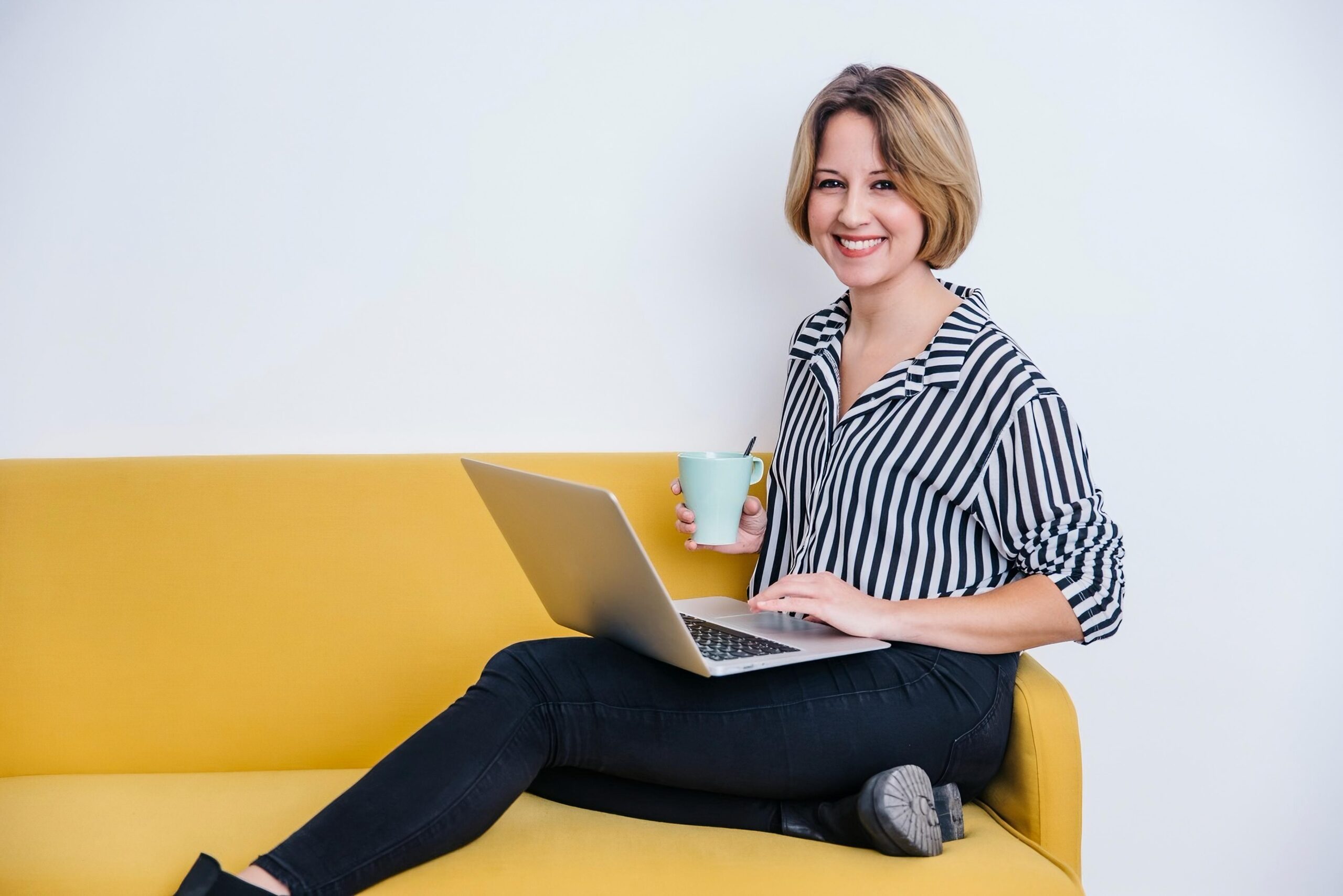 cheerful-woman-with-laptop-transformed